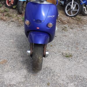 Frontal completo de Aprilia Compay 50 cc: despiece de carrocería, faro y dirección de scooter original