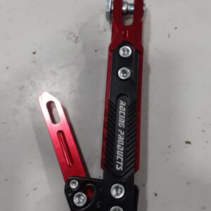 Vista lateral de la pata de cabra universal ajustable de aluminio rojo y negro para moto, destacando su diseño ergonómico.