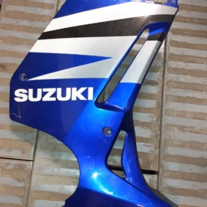 Carenado lateral derecho original Suzuki GS 500 F 2004 recuperado. Color azul y blanco con logotipo Suzuki visible.