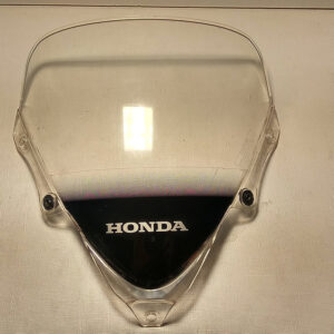 Vista frontal de la cúpula pantalla parabrisas original transparente con logotipo Honda para motocicleta Honda CBR 125 R años 2004 a 2006.