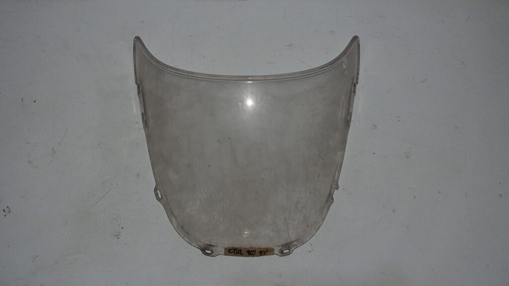 Pantalla cúpula transparente original para Honda CBR 900 RR Fireblade (1993), cúpula frontal verificada con puntos de anclaje intactos.