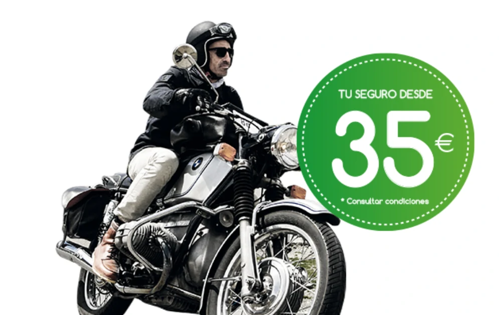 Motociclista conduciendo una moto clásica; AMV ofrece seguros especializados para vehículos históricos desde 35 euros.
